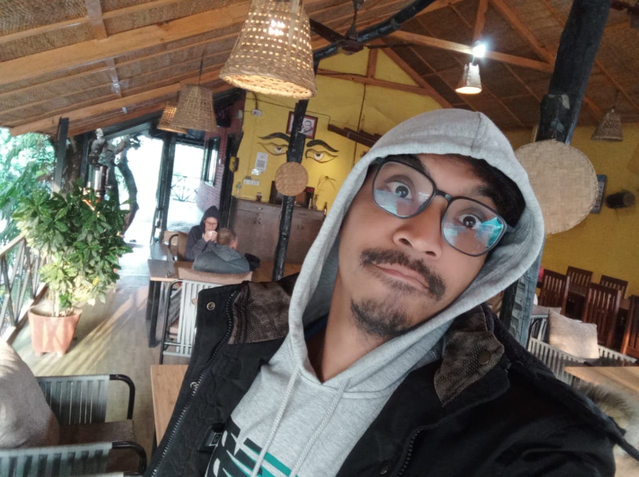 Milan taking a break at a café